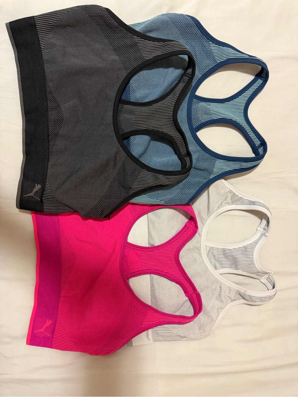 Puma Seamless Racerback Sports Bras in Black, Blue, Pink, White